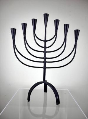 Menorah made of forged and beaten iron